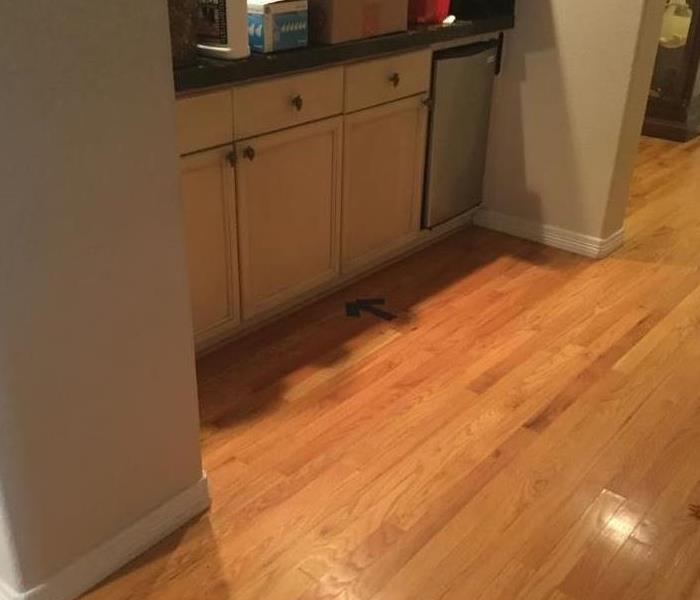 wood floor absorbed water in kitchen