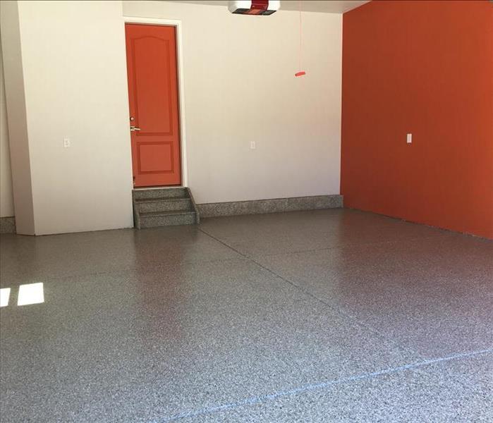 replaced flooring and cleaned garage walls
