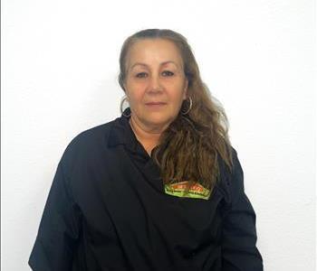 woman with brown hair in servpro gear
