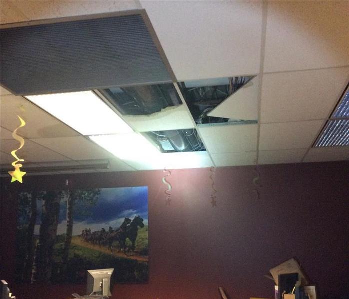 ceiling tiles broken in a office