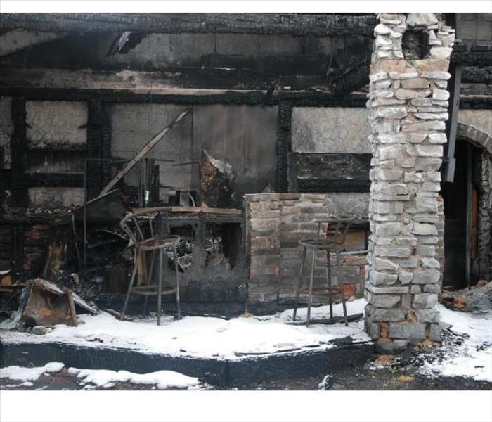 soot and charred kitchen fire