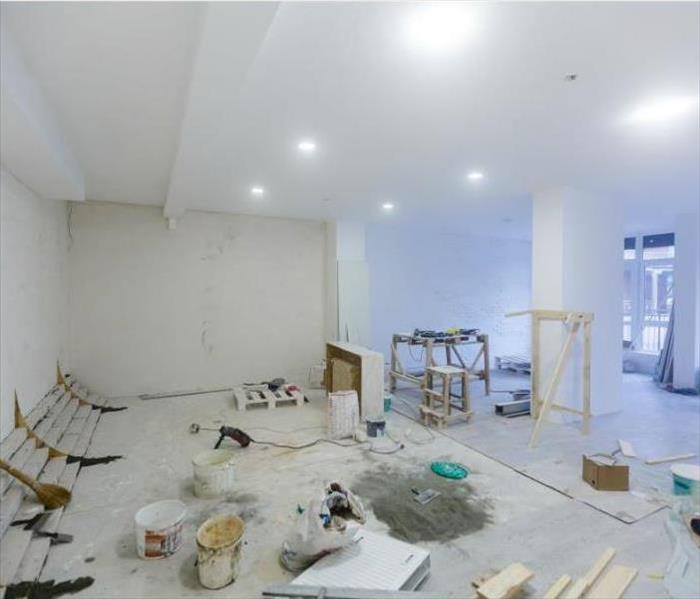 Large white room with construction materials commercial property 