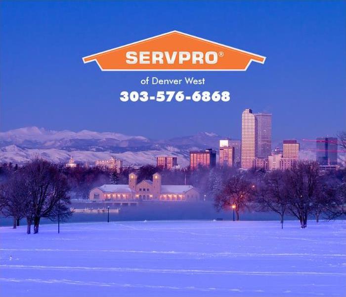 The City of Denver, Colorado, is shown covered in snow.